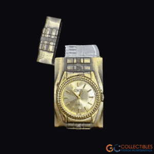 Lote 3023 - Encendedor OWIN – Diseño reloj metálico – Vintage